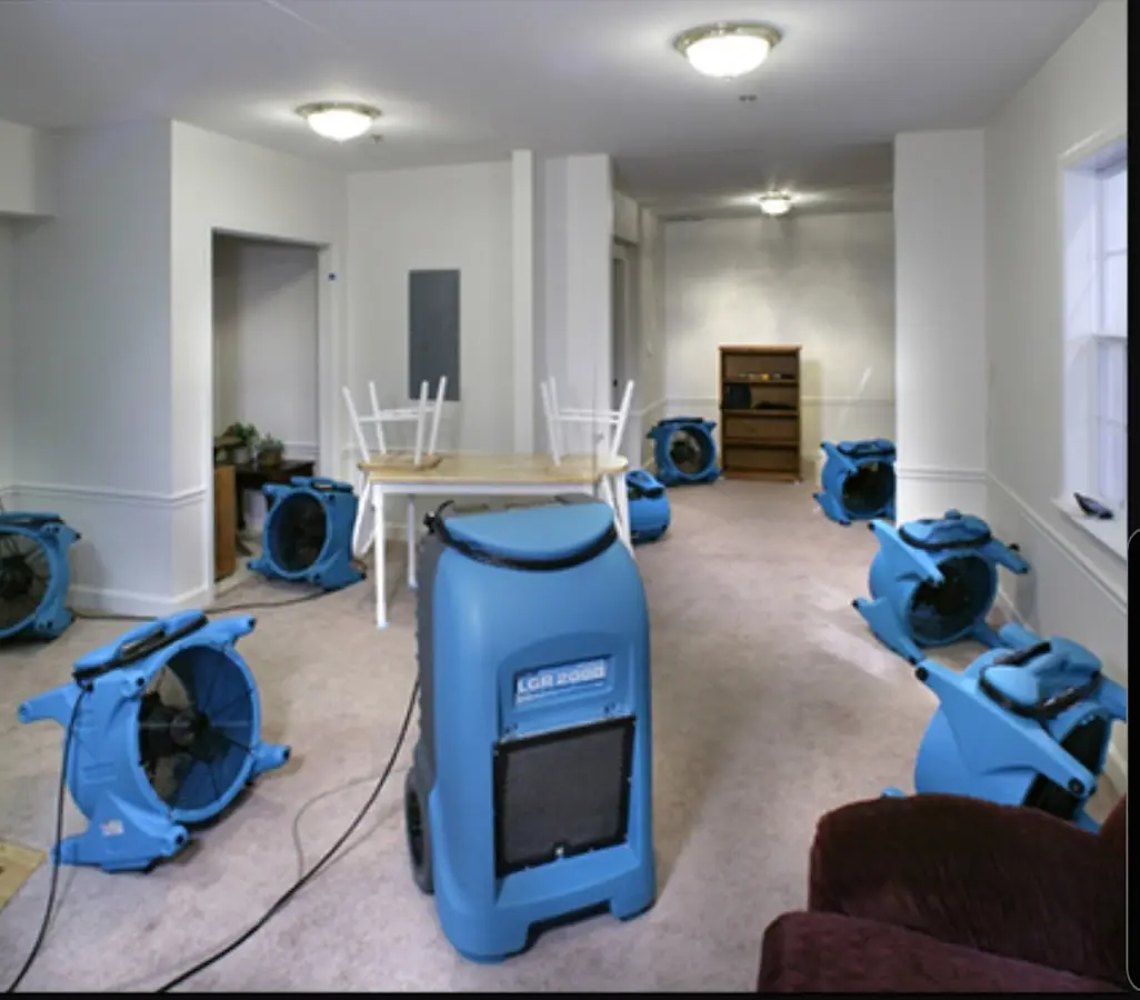 Air movers and dehumidifier setup for Water Extraction & Removal in Lee